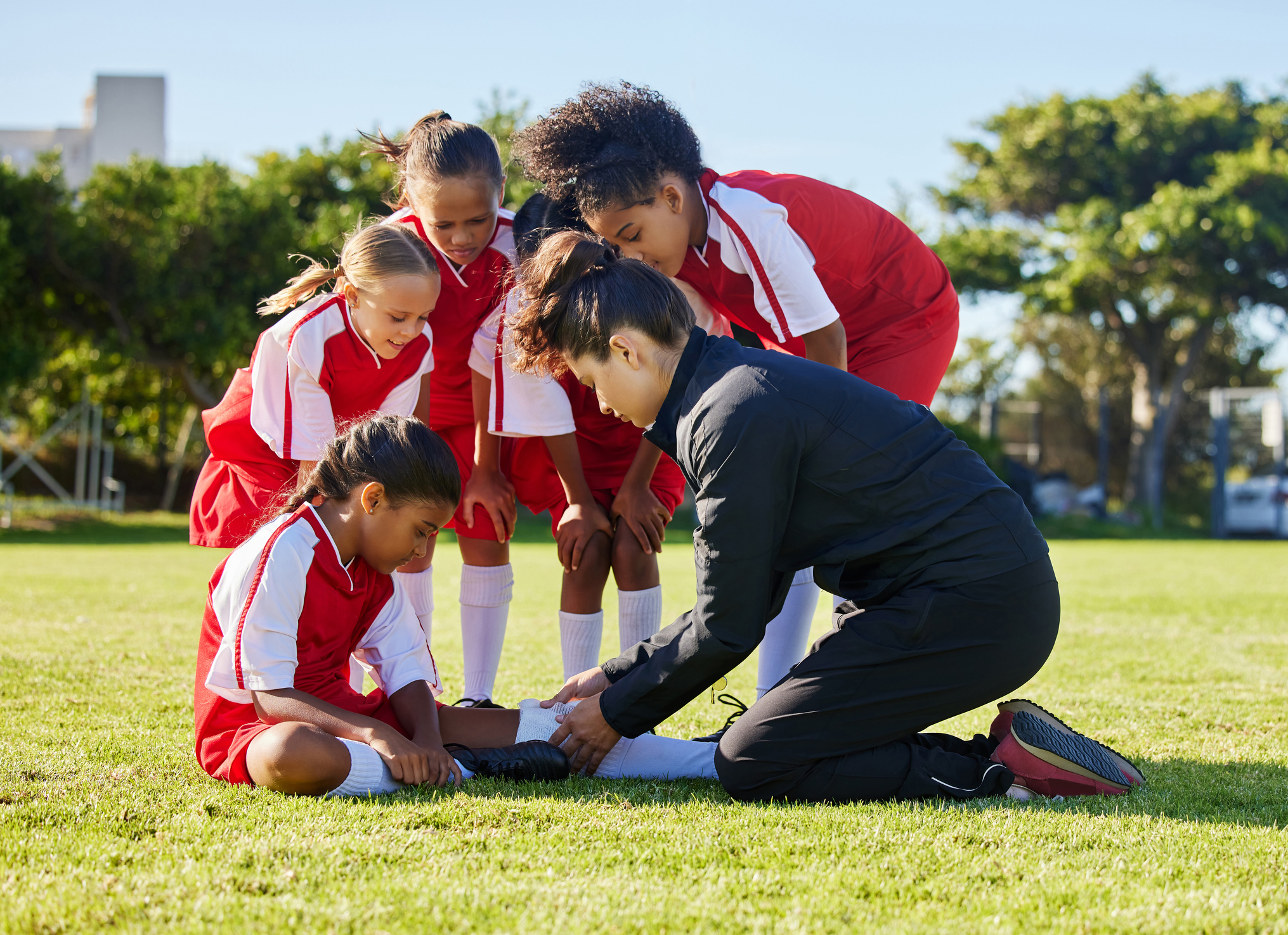 Specialist conducting an online video consultation for a sports injury